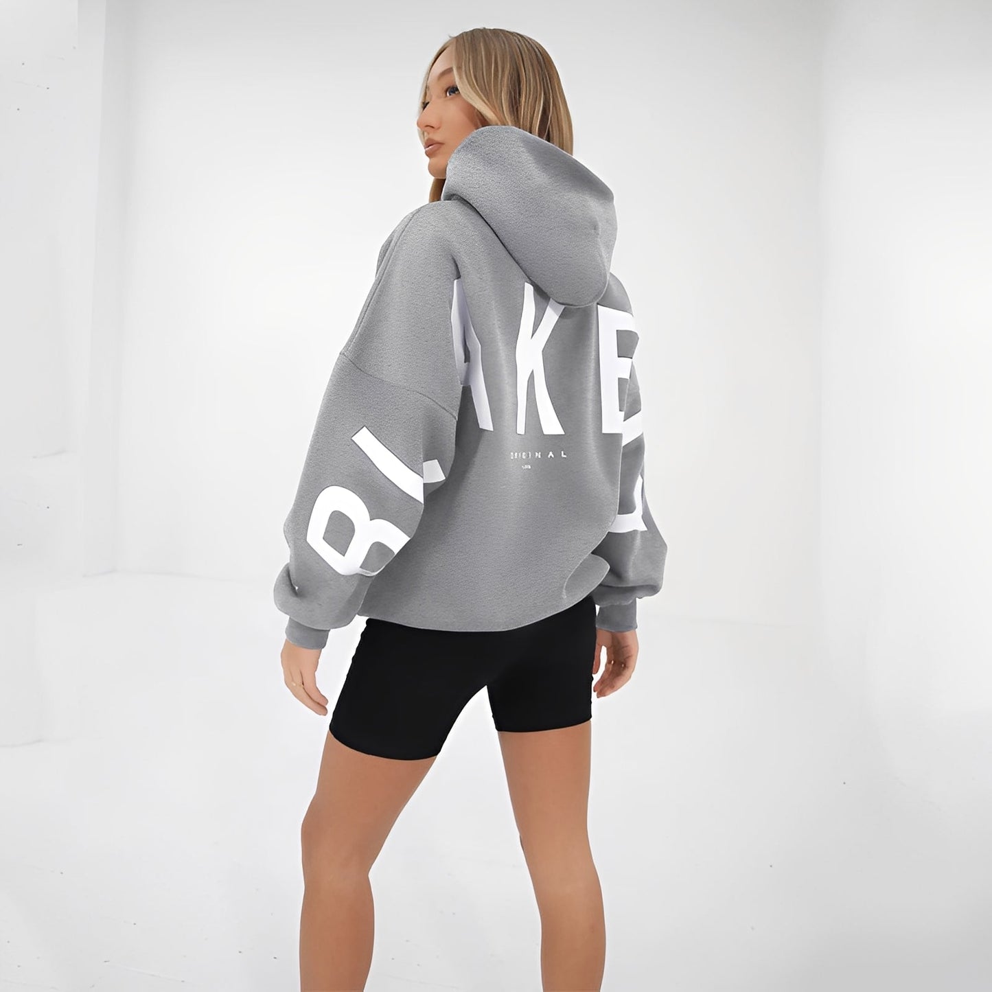 Yvette - Swobodna bluza z kapturem z modnym wzorem dla kobiet