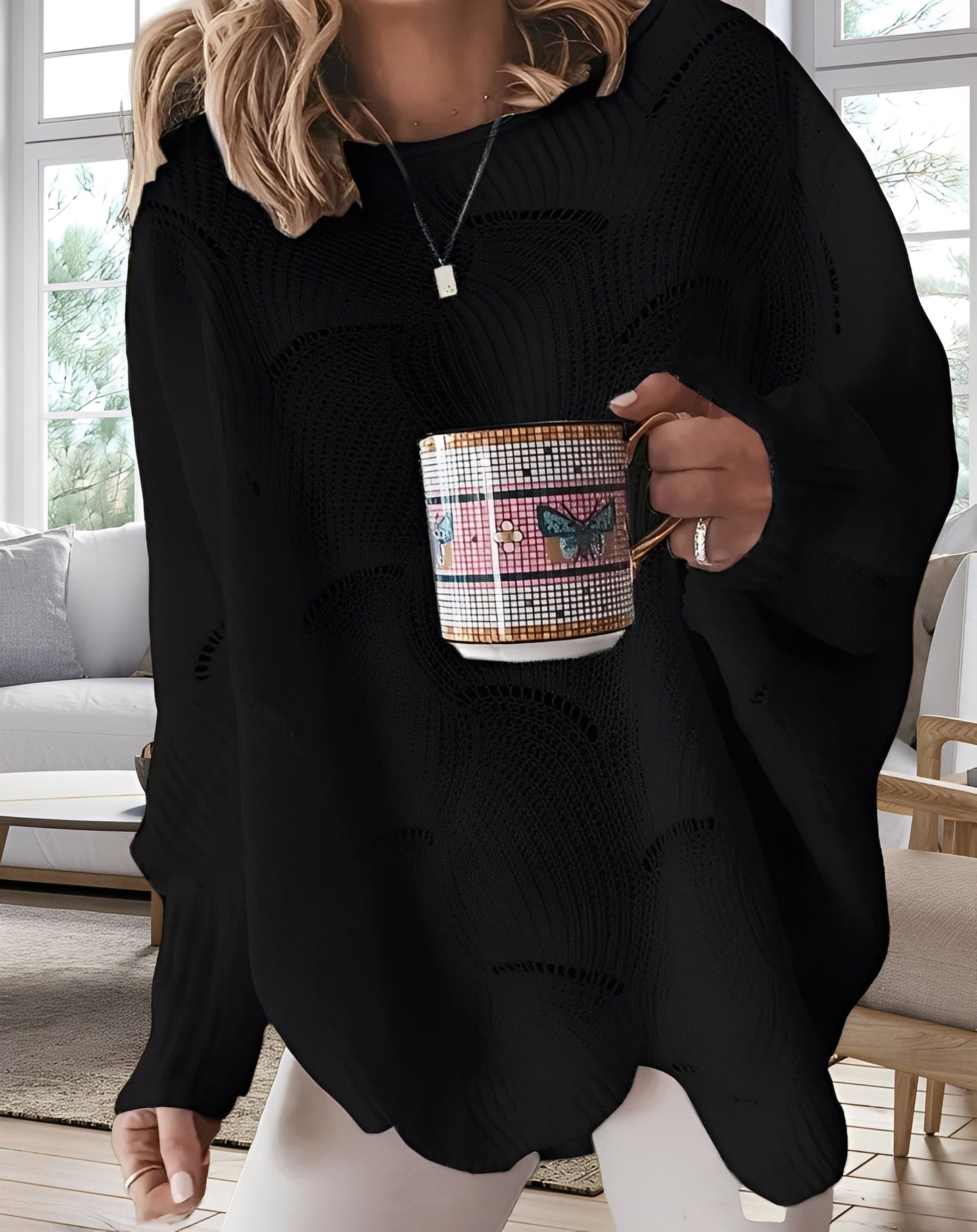 Kassandra - Stylowy, wycięty sweterek damski