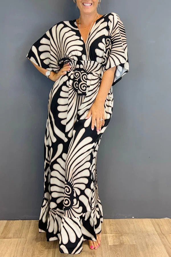 Elvira - Vintage-kombinezon w kwiatowy wzór i falbany rękawy