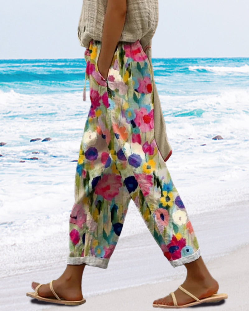 Selma – Szerokie spodnie z kwiatowym wzorem stylizowanym