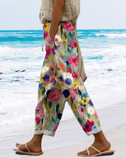 Selma – Szerokie spodnie z kwiatowym wzorem stylizowanym