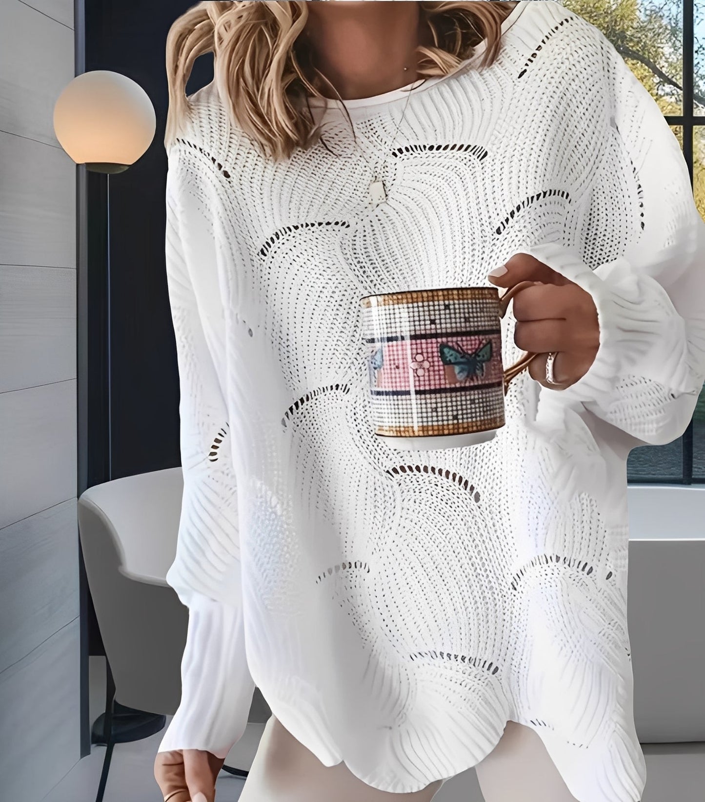 Kassandra - Stylowy, wycięty sweterek damski