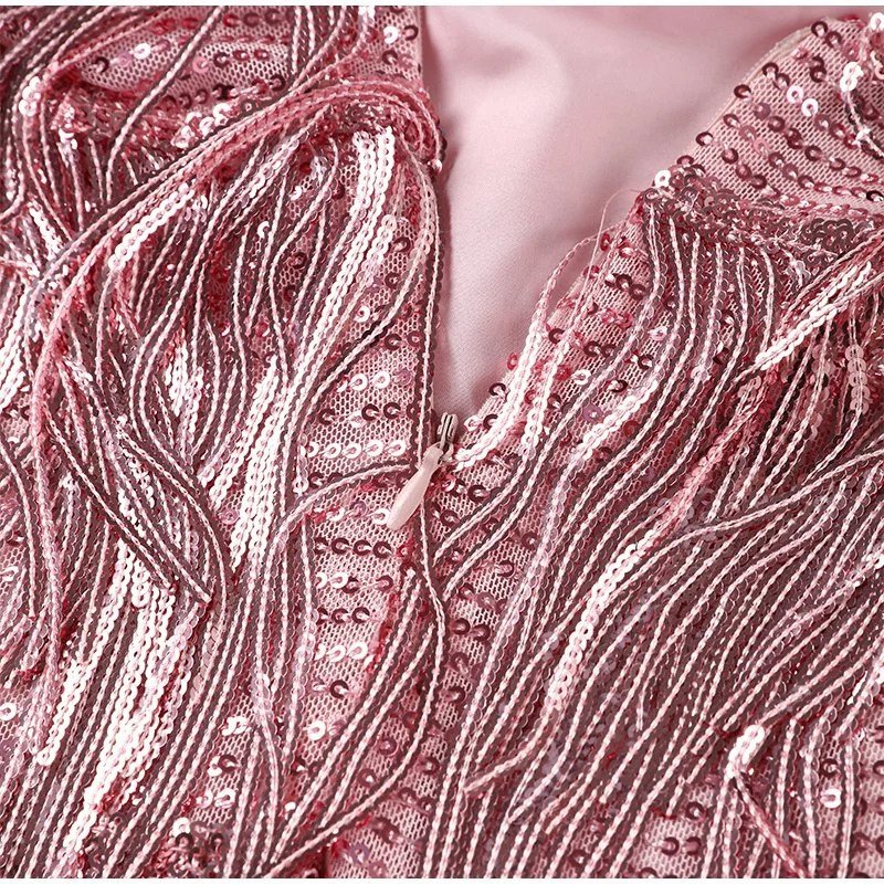 Laura - Sukienka koktajlowa z piórami w eleganckim stylu